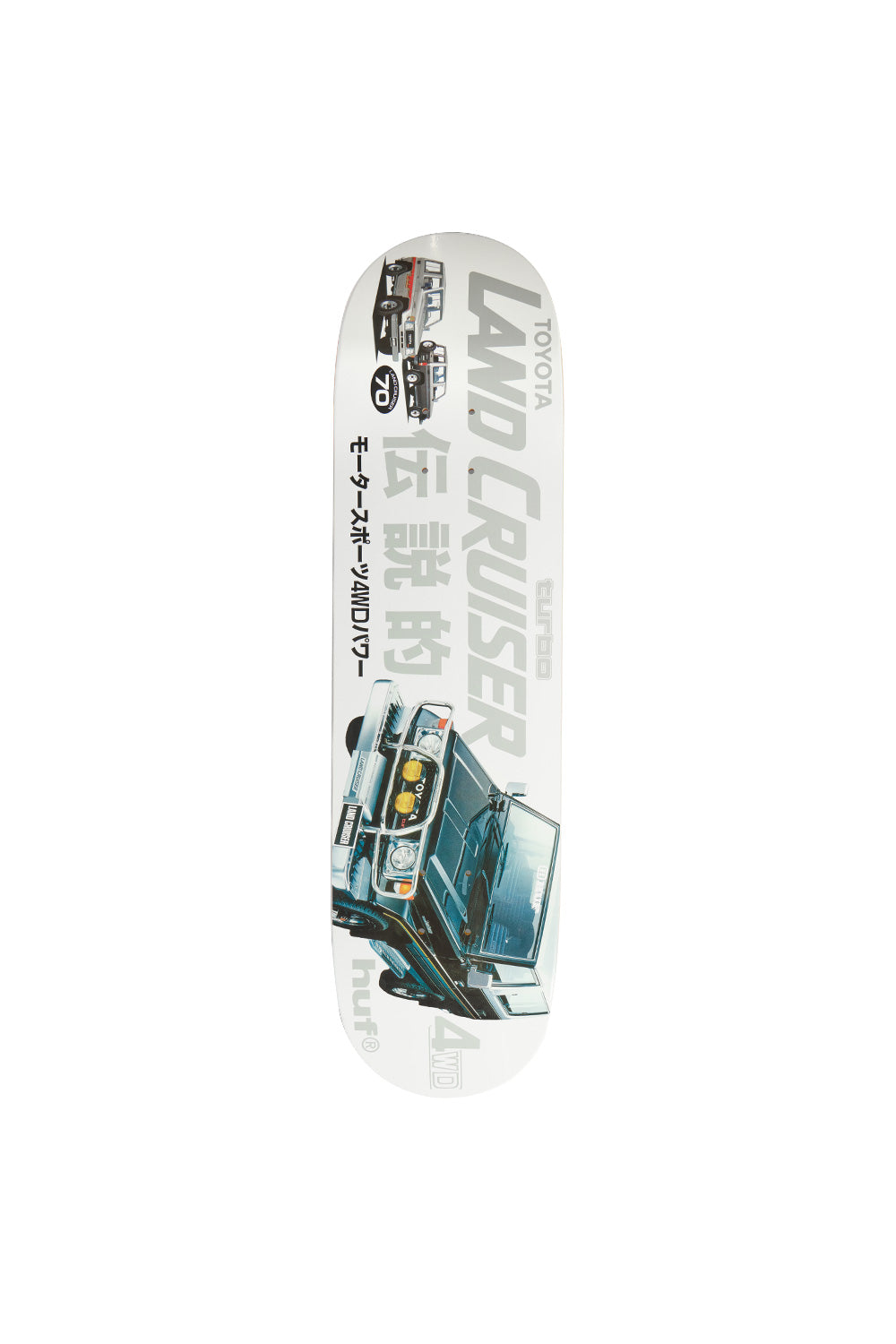 Bottom graphic view of the Huf X Toyota Land Cruiser skateboard deck, displaying a glossy off-white base featuring vintage Japanese advertisement artwork with a photo-real dark teal 70-series Toyota Land Cruiser with bull bar and yellow rally fog lights, a smaller red-and-white 4x4 truck graphic near the nose, large silver and grey "LAND CRUISER" typography, Japanese Kanji and Katakana motorsport script, and a lowercase "huf®" logo by the tail.