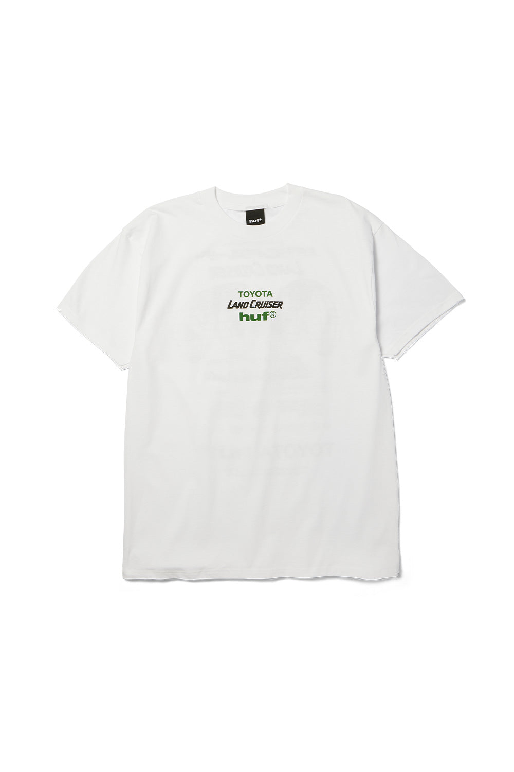 Front flat lay view of the white Huf X Toyota Land Cruiser Global SS T-Shirt, displaying the classic ribbed crewneck collar, relaxed short-sleeve cut, and a minimalist center-chest screen print featuring stacked green and black "TOYOTA LAND CRUISER huf®" branding.