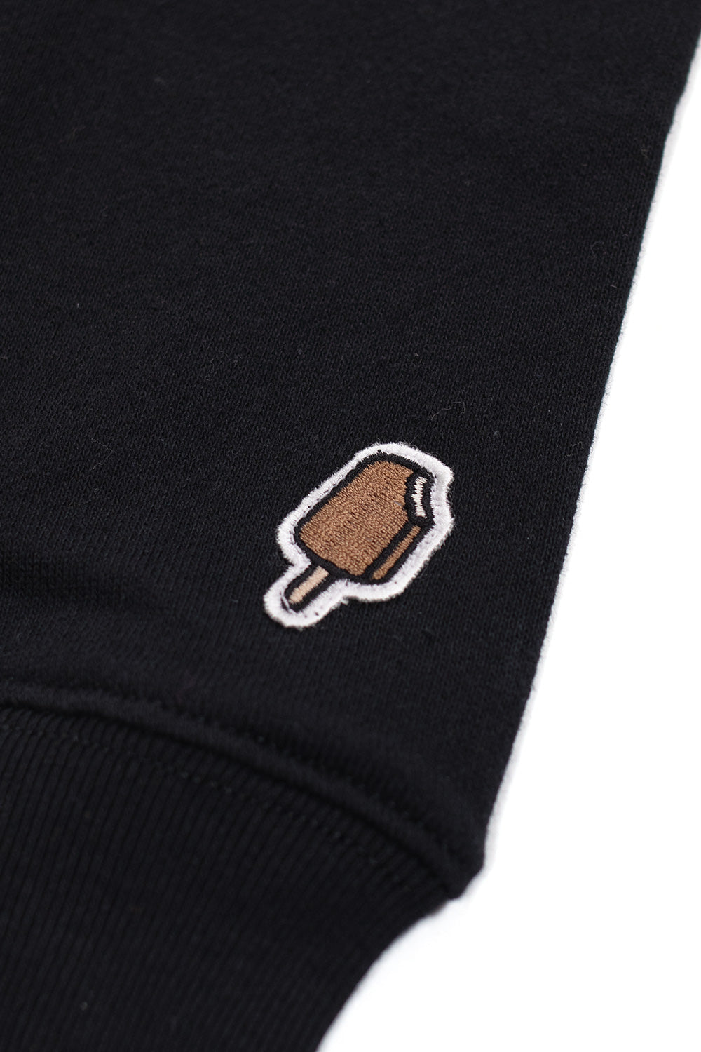Ice Cream Running Dog crewneck in black with stylish leopard pattern for streetwear fashion