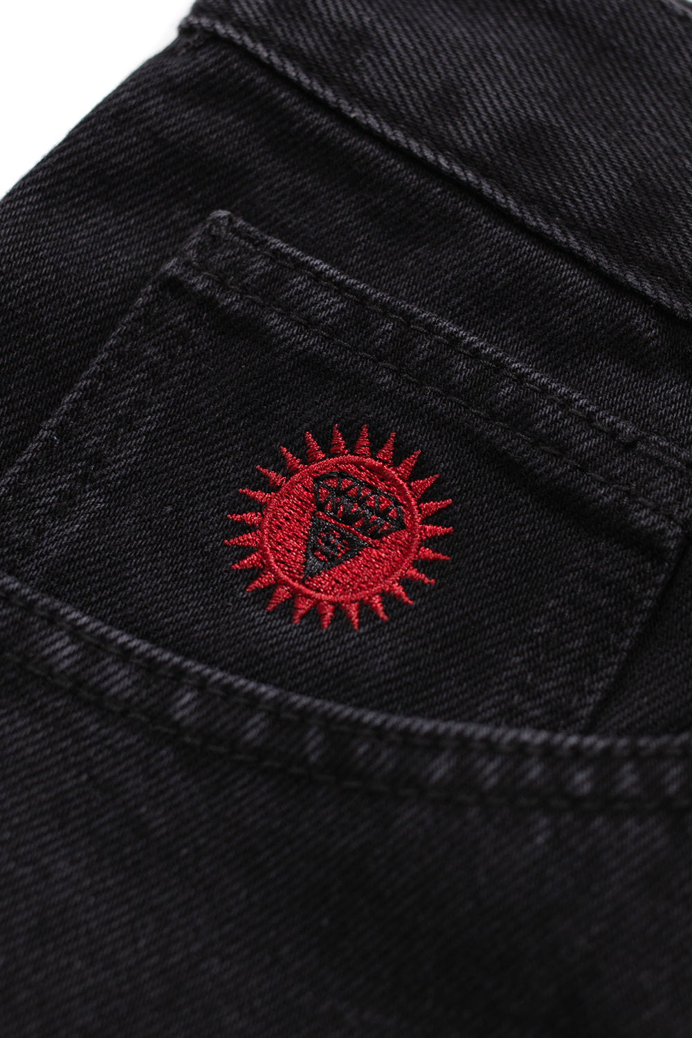 Stylish black denim shorts by Ice Cream with green Running Dog graphics for urban fashion