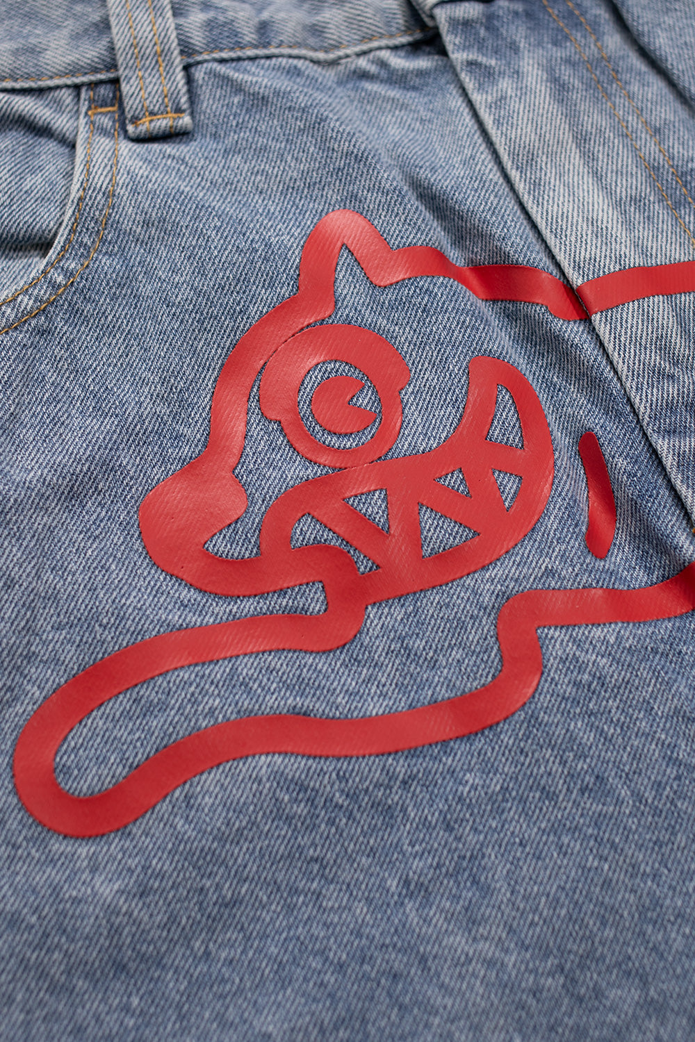 Ice Cream double scoop denim pants in light wash blue with red Running Dog logo detail