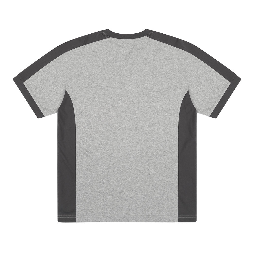 Back flat lay studio perspective of the Metalwood Studio Creature T-Shirt in Heather Grey, highlighting the seamless heathered grey back body framed by dark charcoal raglan-style shoulder panels, ergonomic curved side inserts, and matching charcoal ribbed sleeve trims.