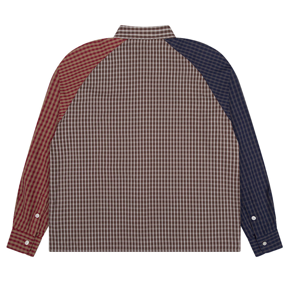 Back flat lay studio perspective of the Metalwood Studio Frankenstein Button Up Shirt, displaying the seamless brown plaid back panel framed by the contrasting red and dark navy blue raglan sleeves, pointed collar, straight cut hem, and single-button barrel cuffs.