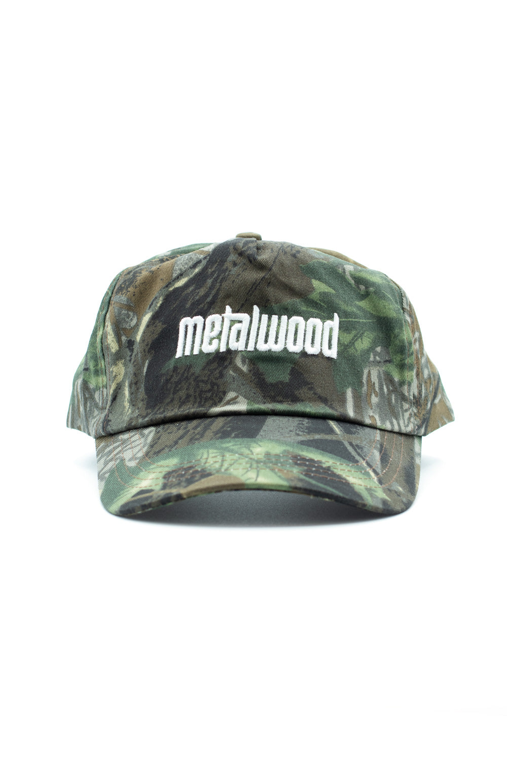 Men’s Metalwood Studio Metal Logo 5 Panel Cap in green real leaf camo, adjustable Velcro fastener, embroidered branding, and sweatband interior.