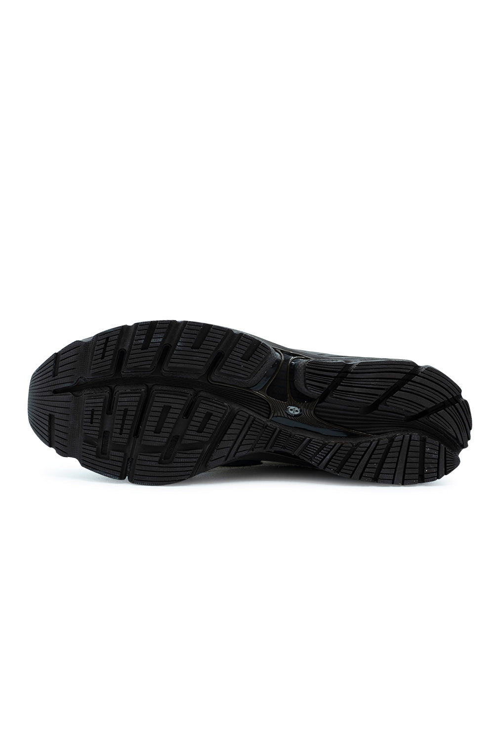 Full bottom perspective of the all-black durable rubber outsole on the New Balance 1890A, displaying the segmented multi-directional traction tread pods, midfoot torsion guidance support, and forefoot flex grooves.