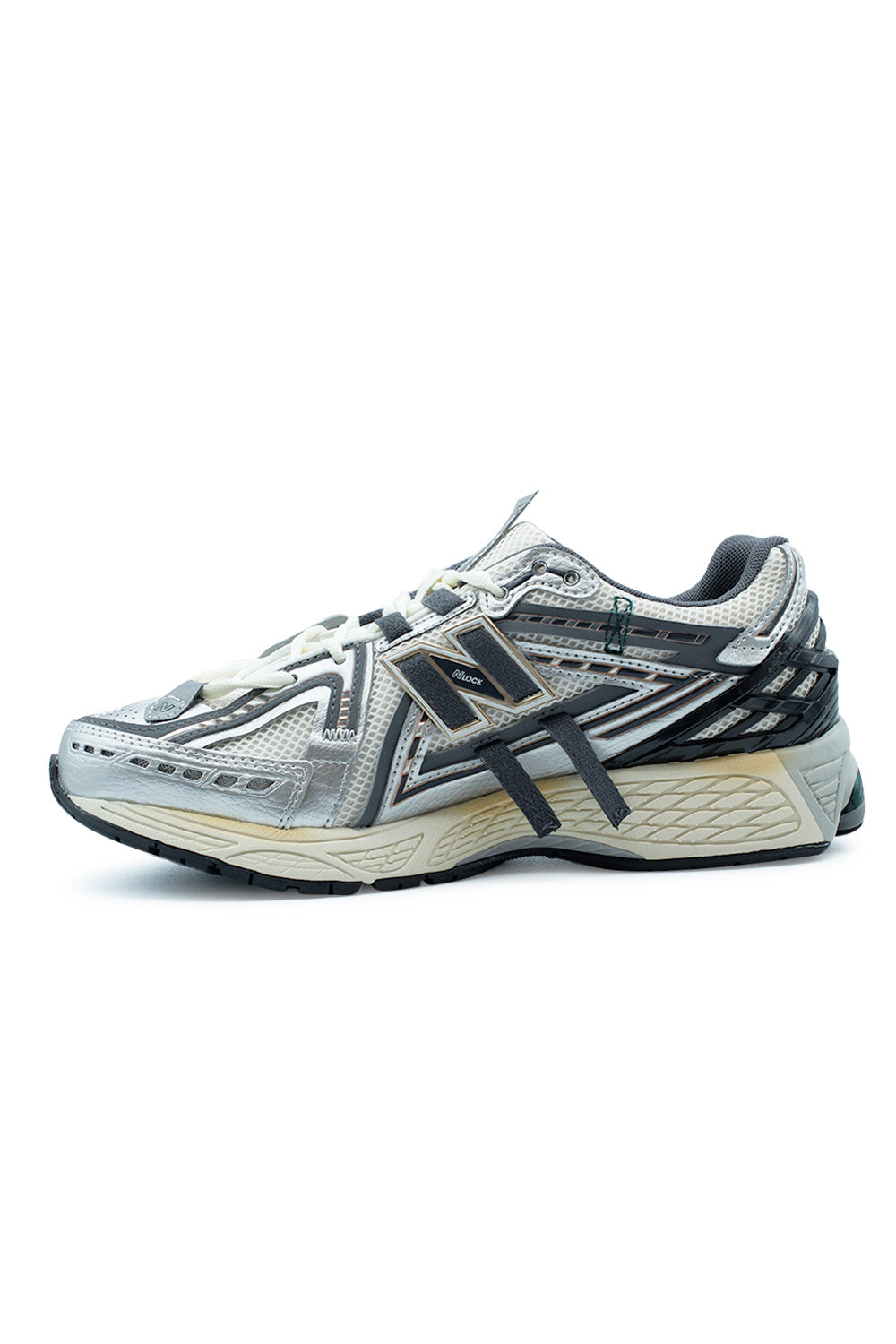 Medial side view of the New Balance 1906A M1906AD featuring Stability Web arch support, responsive ABZORB midsole, N-ergy shock absorption, lightweight performance platform and futuristic deconstructed sneaker design.