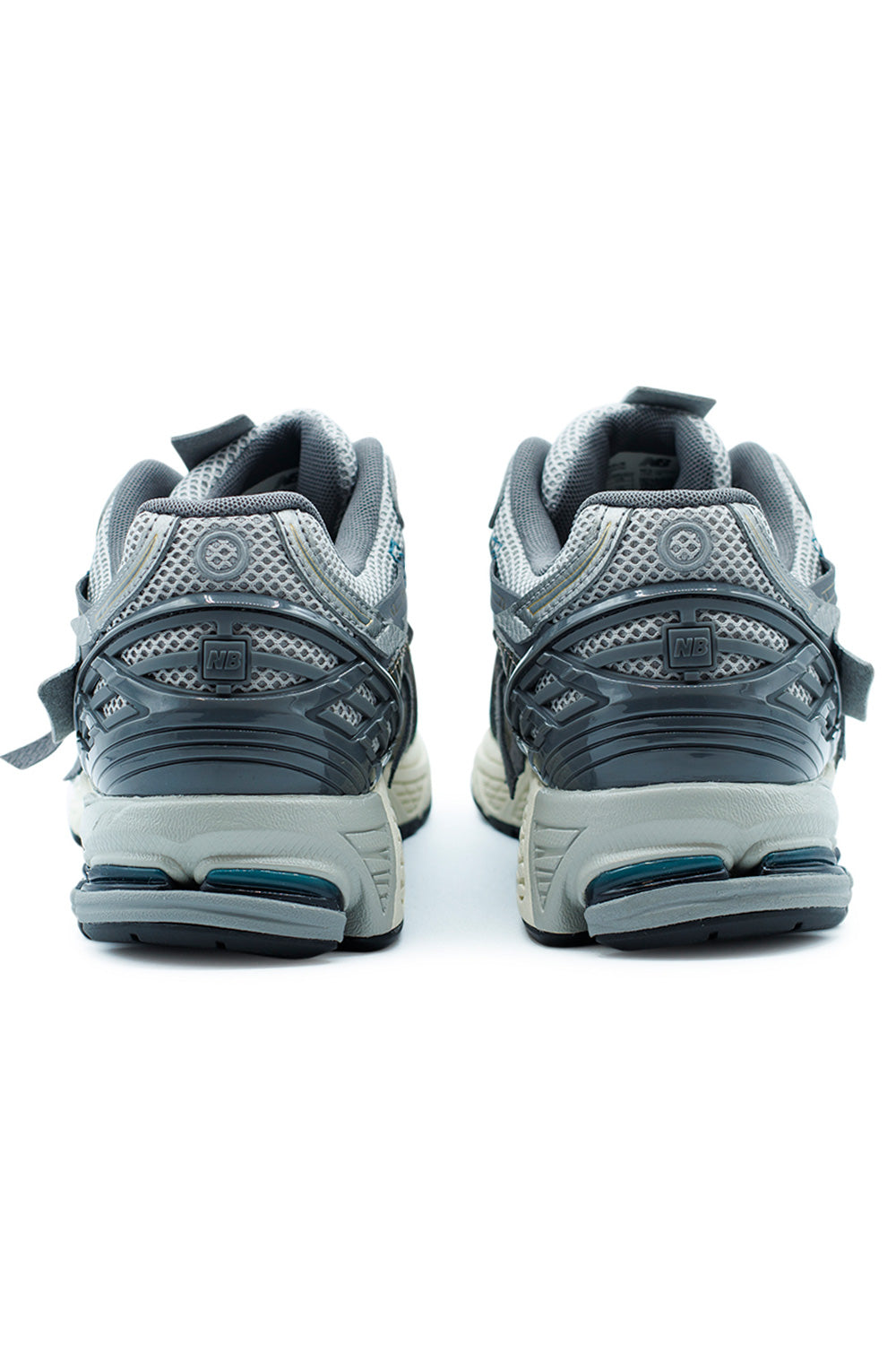 Rear view of New Balance 1906A Thunder Brown Slate Grey sneaker showcasing TPU heel cage support, Stability Web arch system and segmented N-ergy shock absorption pods