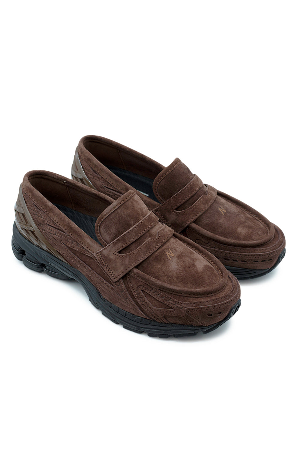 pair of New Balance 1906L Rich Oak Black Cement loafers combining luxury suede loafer aesthetics with modern sneaker technology for streetwear and smart casual outfits