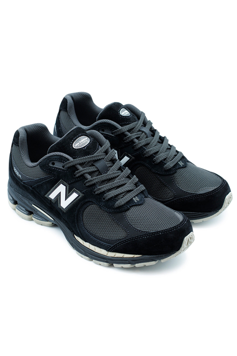 New Balance 2002R Black Timberwolf White – modern performance sneaker with ABZORB cushioning, Stability Web arch support, and retro design.