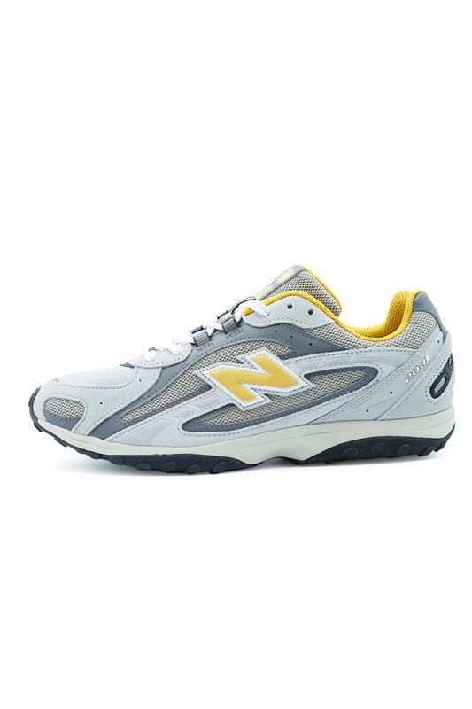 New Balance 204L Raincloud Baroque Gold unisex sneaker with suede and mesh upper, retro running silhouette, and lightweight EVA cushioning.