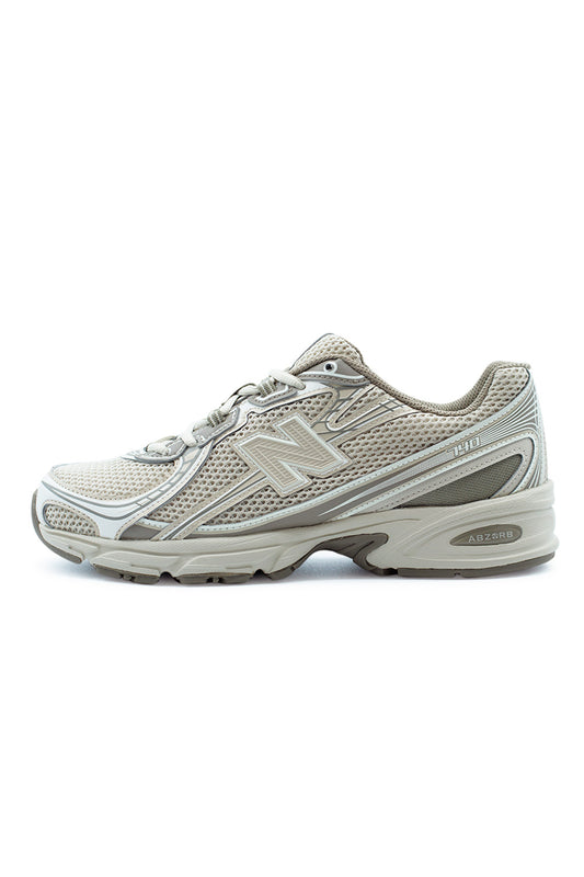 New Balance 740 Dockside Timberwolf Sea Salt sneaker in side profile, featuring breathable open mesh upper, layered synthetic overlays, molded TPU N logo and ABZORB cushioned midsole inspired by Y2K running shoes.