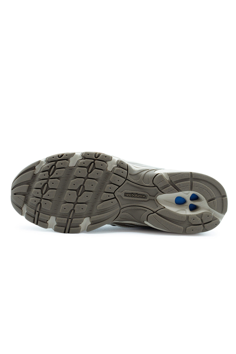 Outsole view of New Balance 740 Sea Salt sneaker displaying durable rubber traction pattern, performance-inspired sole design and ABZORB midsole cushioning rooted in early 2000s running technology.