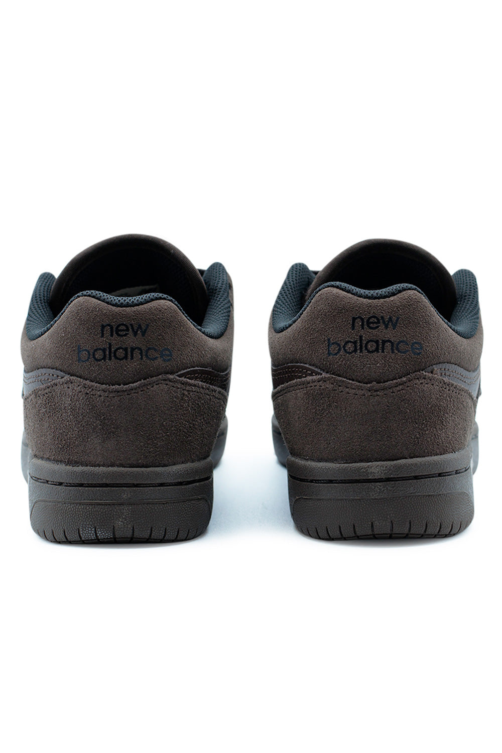 Back view of New Balance Numeric 480 Chocolate Brown low-top sneakers showing padded heel support, durable outsole, and timeless basketball heritage styling