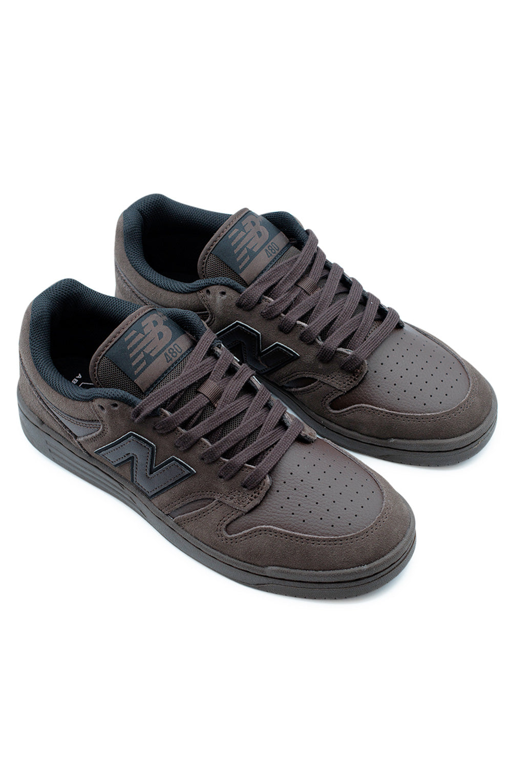 Angled pair of New Balance Numeric 480 Chocolate Brown skate sneakers with mixed suede and leather upper, classic cupsole shape, and everyday streetwear appeal