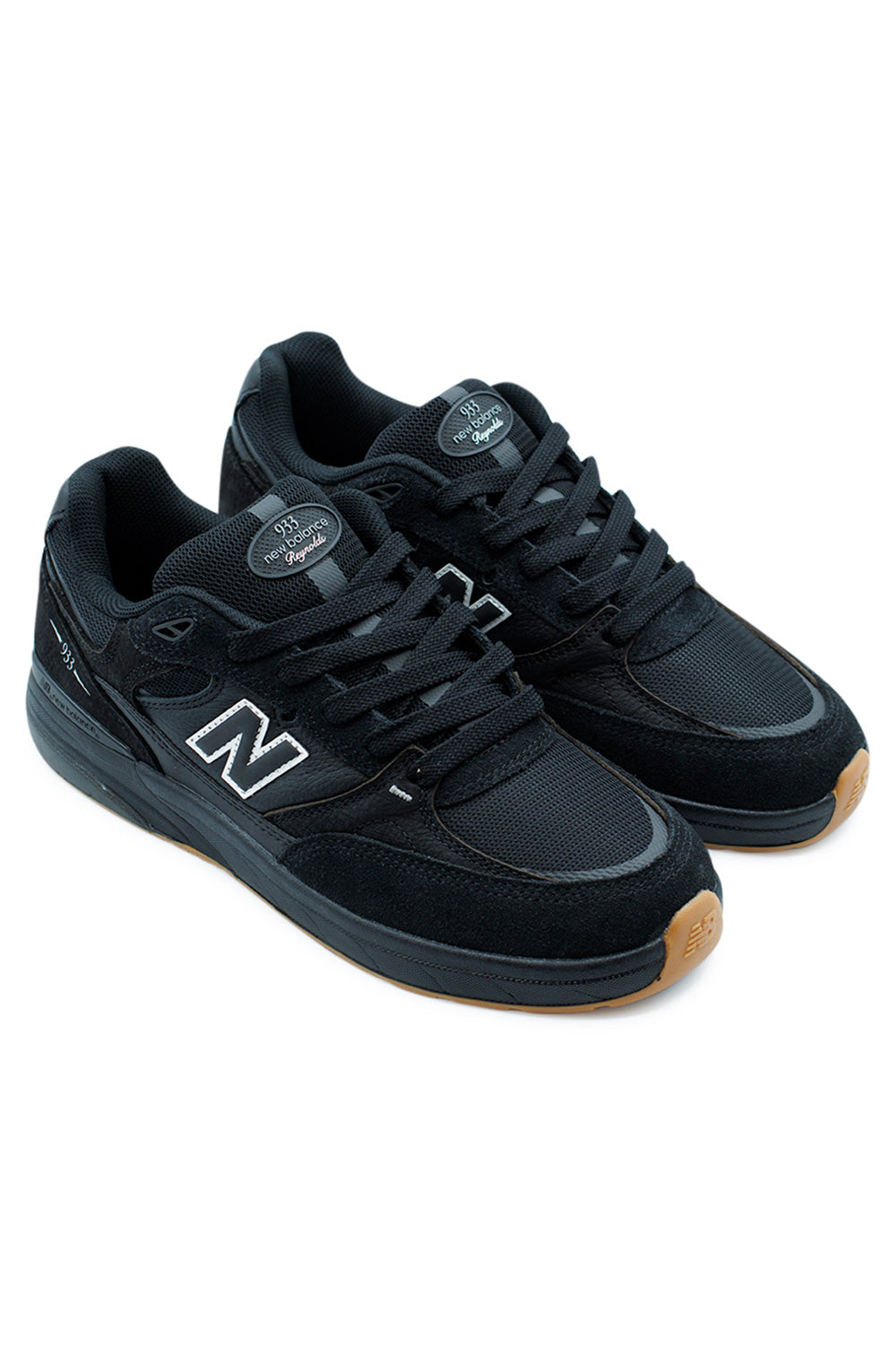 Side view of New Balance Numeric 933 Andrew Reynolds Black skateboarding shoes featuring ABZORB midsole and reinforced ollie patch.
