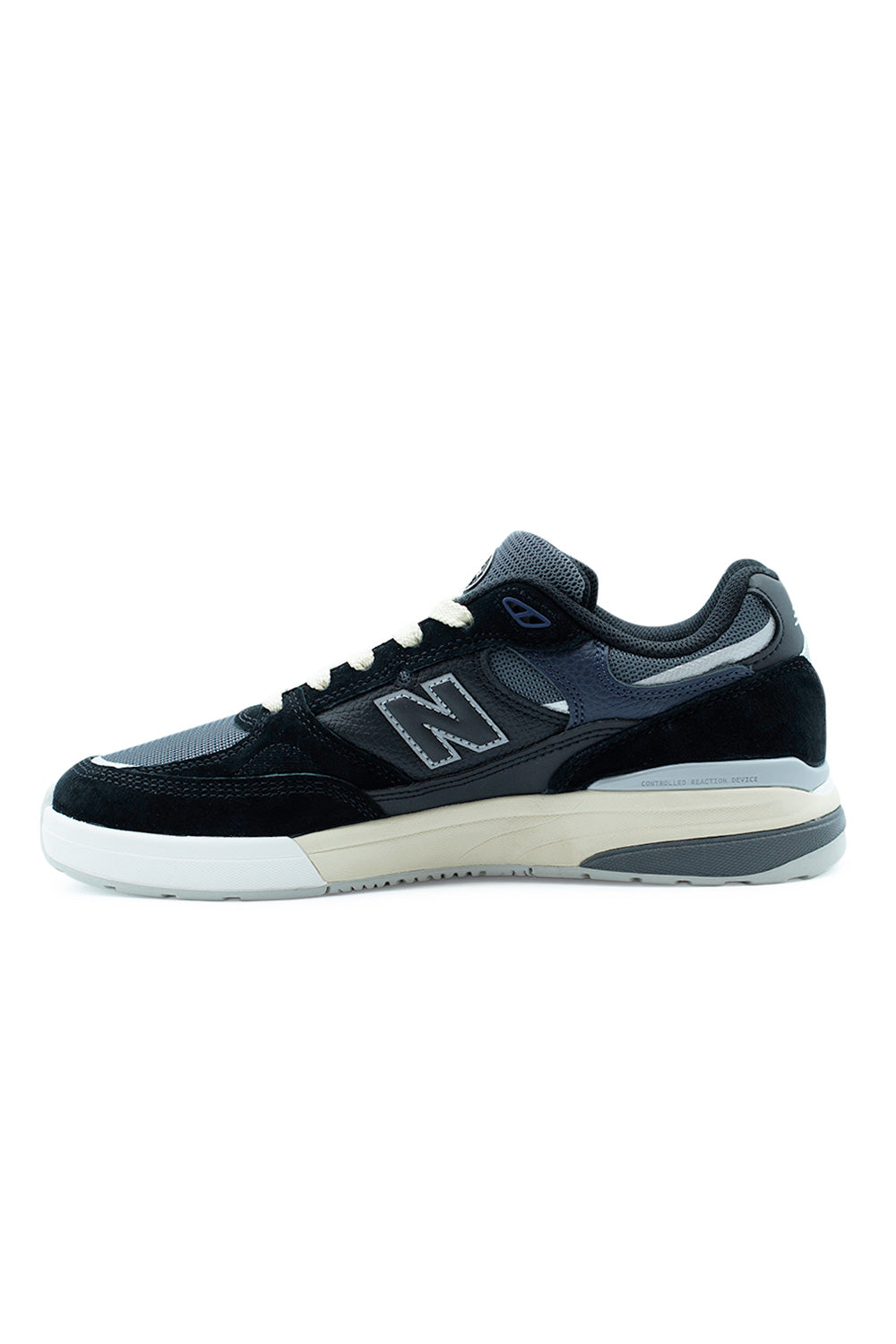 Side profile of New Balance Numeric 933 Black Eclipse Andrew Reynolds signature sneaker with iconic N logo and durable nubuck construction