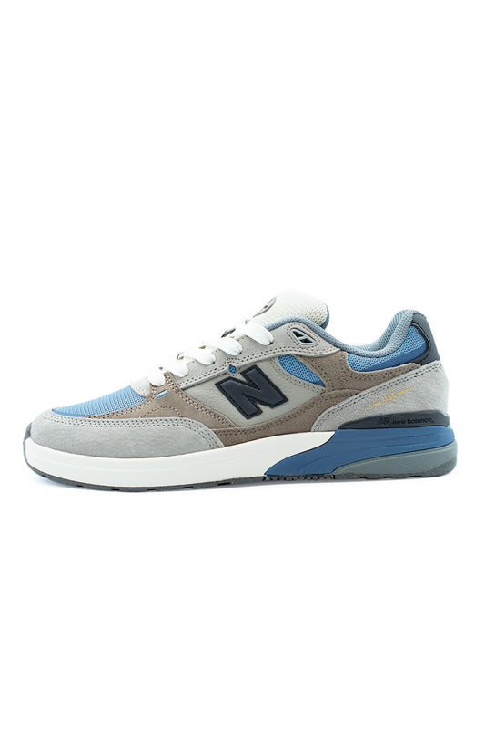 New Balance Numeric 933 Andrew Reynolds skate shoe in Mushroom Still Water colorway featuring nubuck and leather upper, mesh panels and ABZORB cushioned sole for premium skateboarding performance