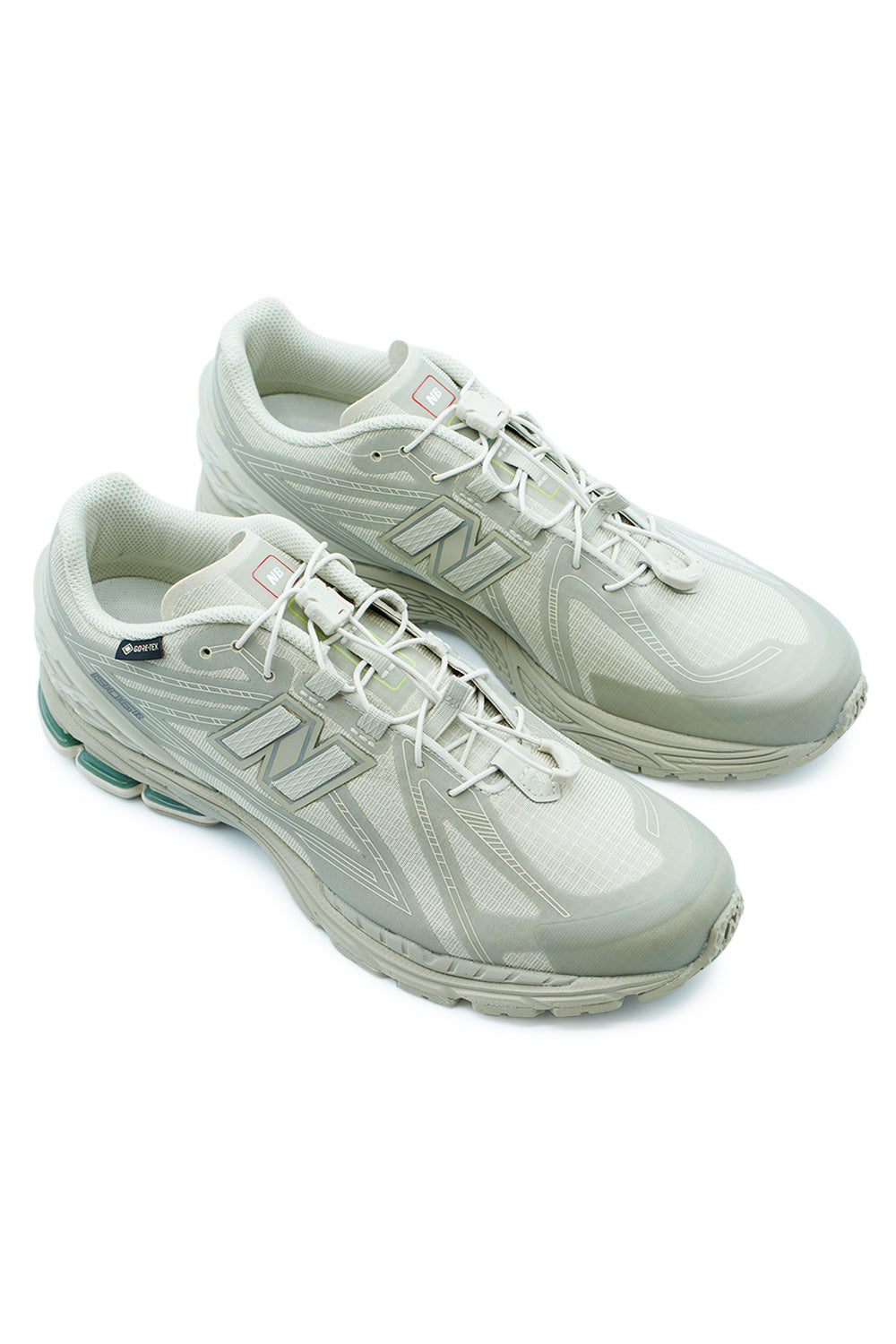 Angled view of New Balance U1906X Gore-Tex Shipyard Oregano trainers, lifestyle sneaker with trail-ready design and early 2000s aesthetic