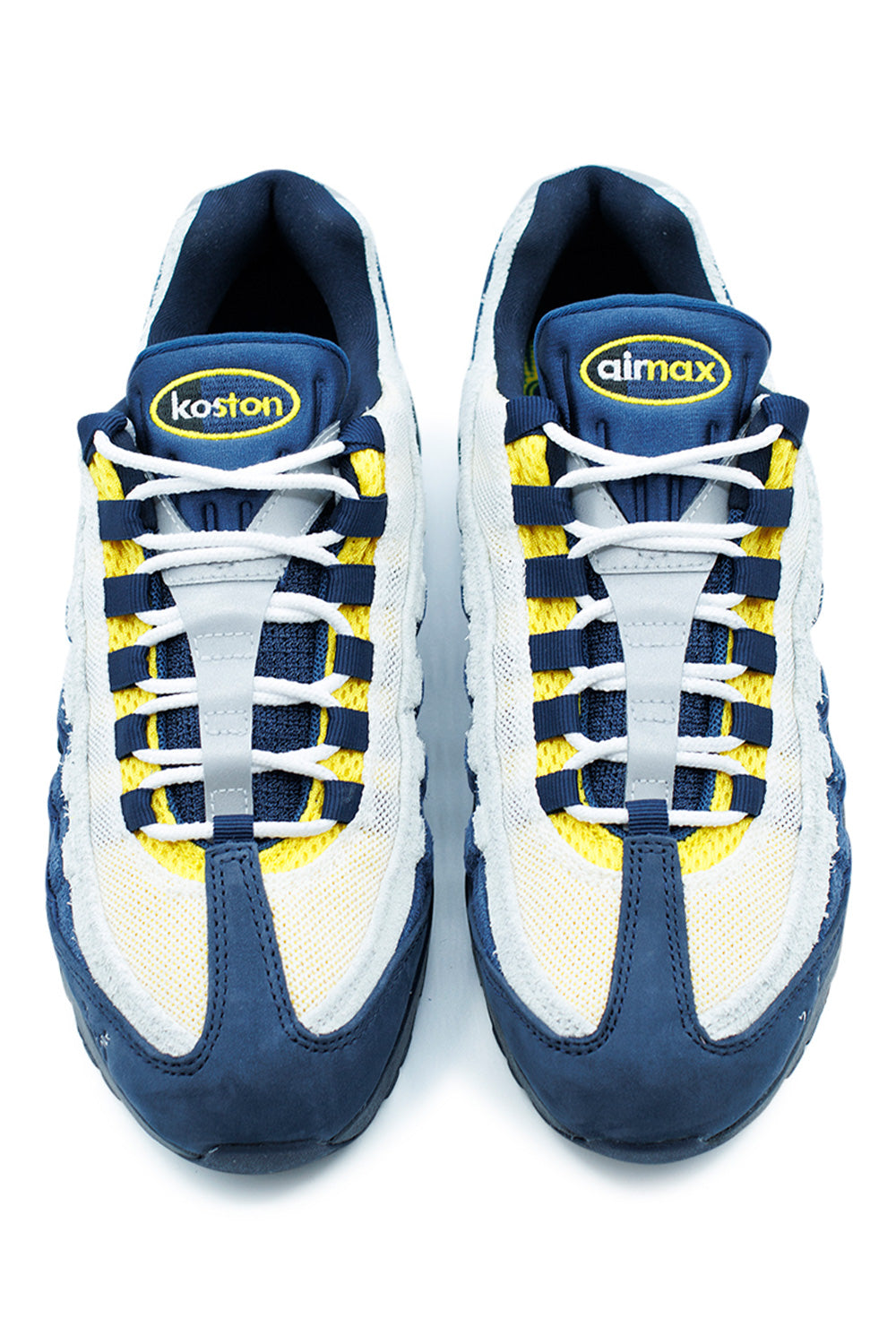 Unisex Nike SB Air Max 95 Eric Koston Obsidian Speed Yellow, skate-adapted sneaker featuring herringbone outsole for grip and Thai lettering detail.