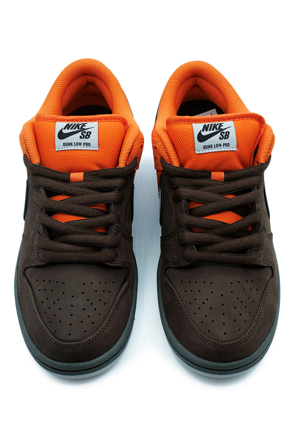 Front view of Nike SB Dunk Low Pro Safety Orange Wolf Grey featuring padded Nike SB tongue, dark brown laces, perforated toe box and vibrant orange skate shoe design inspired by San Francisco Muni Fast Pass