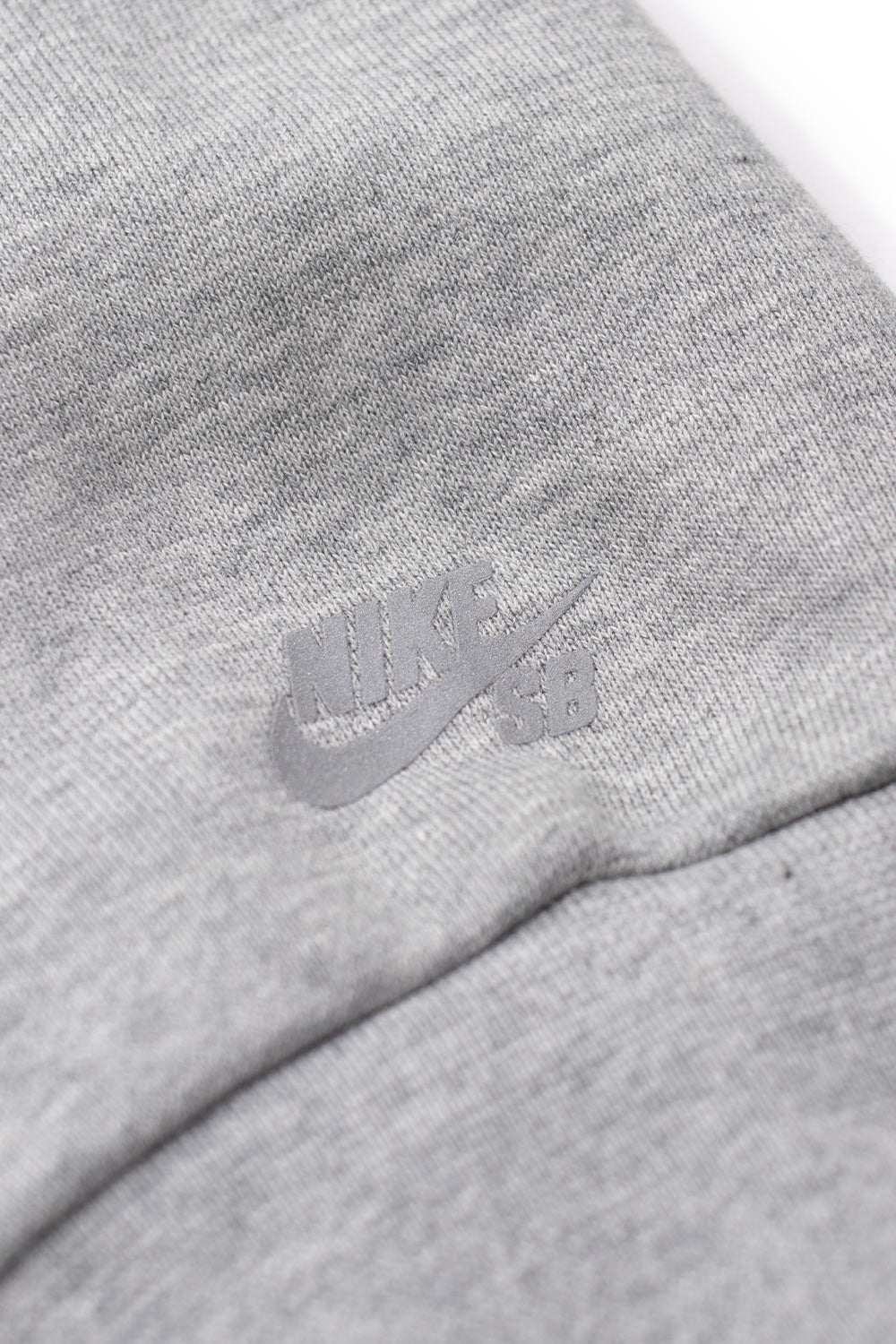 High-quality Nike SB Koston Crewneck Sweatshirt Grey Heather, skate-inspired design with loose fit, embroidered graphic, and reflective accents.