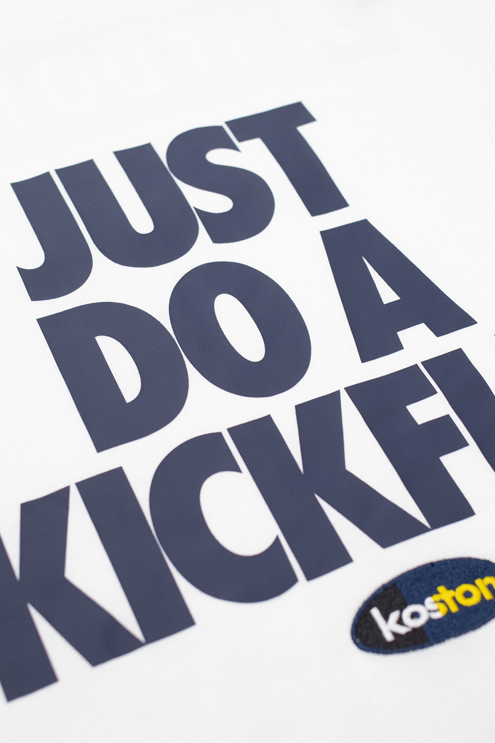 Nike SB M90 Koston White T-Shirt, Eric Koston-inspired loose-fit skate shirt with printed design, embroidered logo, and premium cotton fabric.