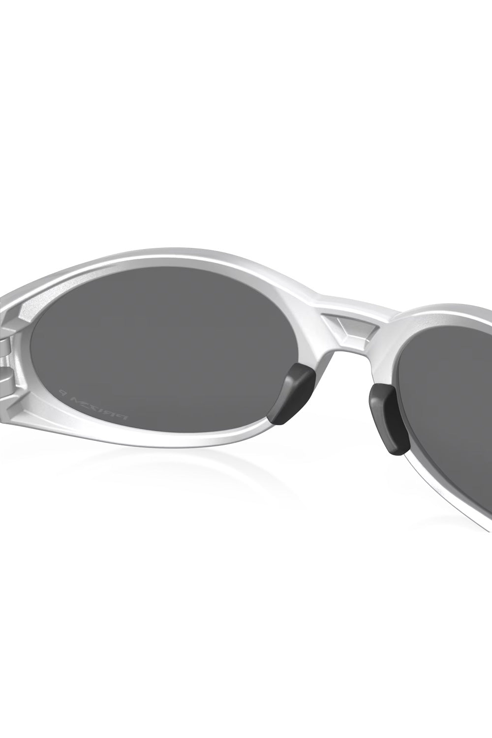 Interior view looking through the Prizm Black Polarized lenses of the metallic silver Oakley Eye Jacket Redux sunglasses frame.