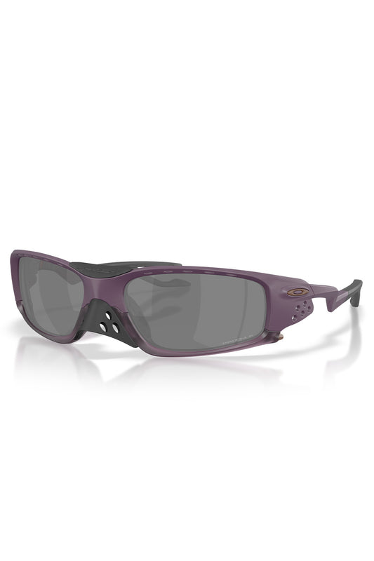 Front three-quarter perspective of the Oakley Plantaris SQ sunglasses in Matte Aubergine, showcasing the deep purple sculptural biomechanical frame, squared Prizm Black Polarized lenses, side shield ventilation ports, bronze ellipse logo, and removable perforated black nose guard.
