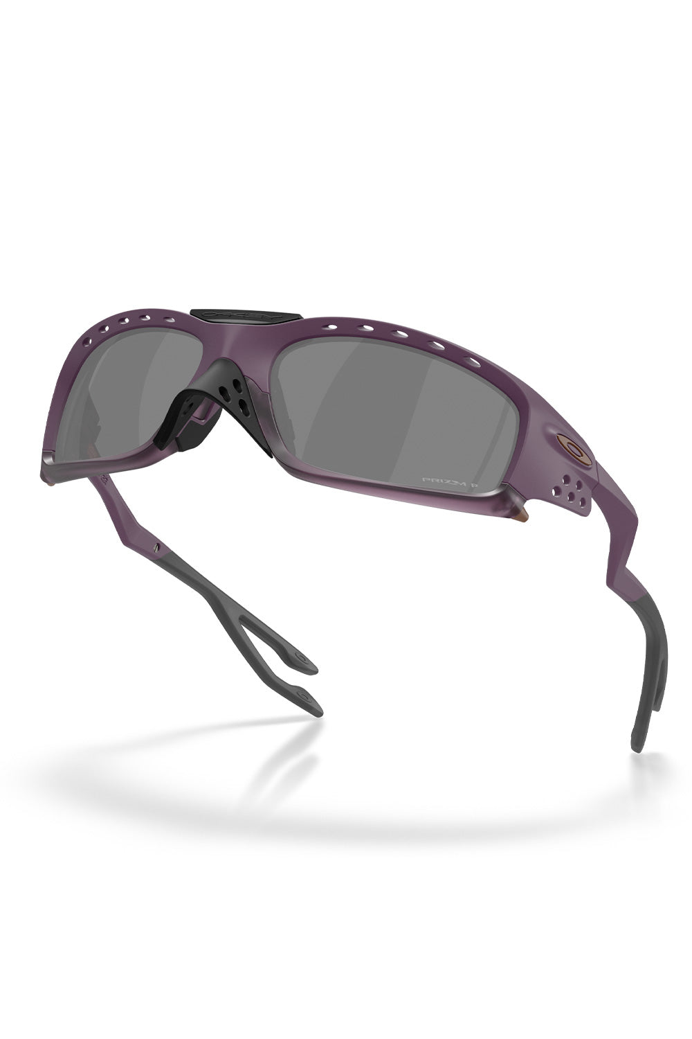 Floating low-angle three-quarter view of the Matte Aubergine Oakley Plantaris SQ sunglasses, illustrating the aggressive wrap-around coverage, engineered brow vents, and dark Prizm Black Polarized optics.