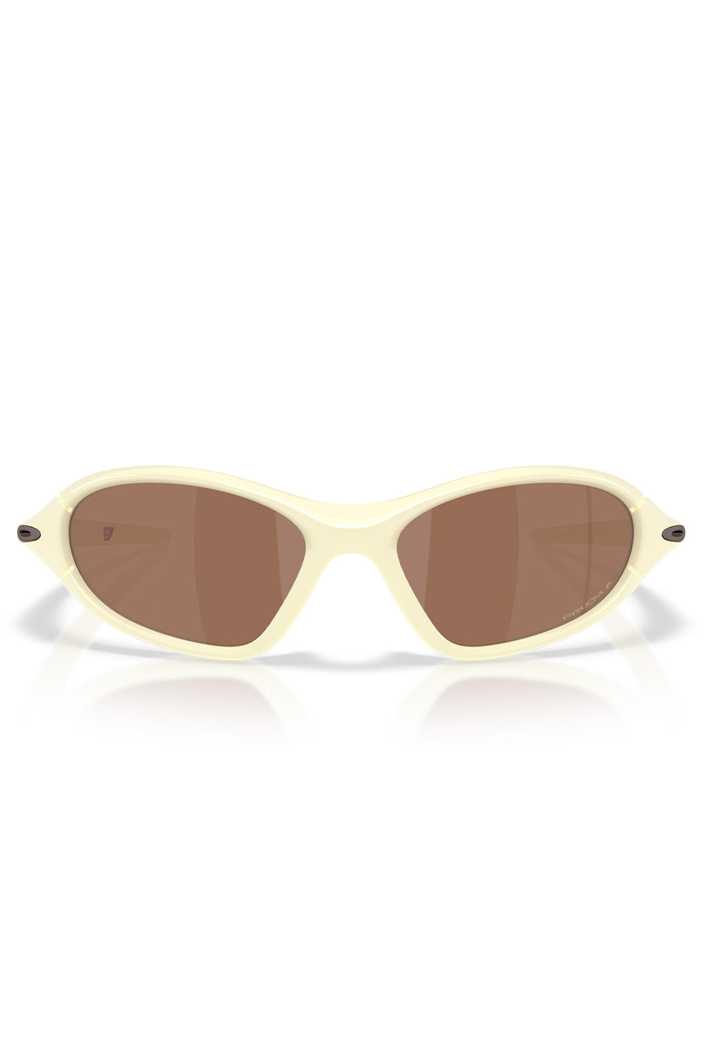 Direct front view of the Oakley Portal Jacket sunglasses in Cream, highlighting the 90s-inspired aerodynamic sweeping frame shape, contoured nose bridge, and wide Prizm Tungsten Polarized protective lenses.