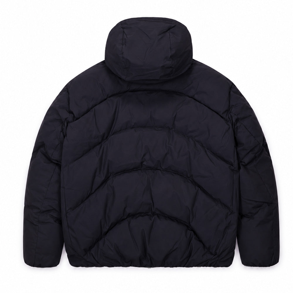 Back flat lay studio view of the black Oakley Retrofuel Gore-Tex Down Jacket, highlighting the anatomical curved horizontal baffle chambers filled with insulating 700 fill power down, contoured storm hood, articulated sleeves, and clean elasticated hem.