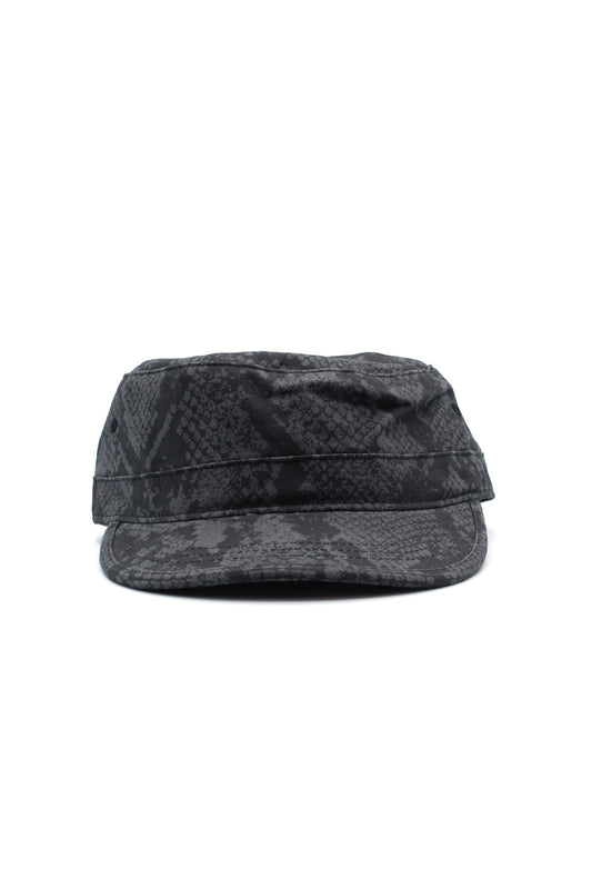 Front studio view of the Obey Page Cadet Cap, crafted from 100% cotton with a dark grey and black pigment-dyed snake skin scale pattern, featuring a classic flat-top military pillbox crown, structured horizontal band, and curved visor brim.