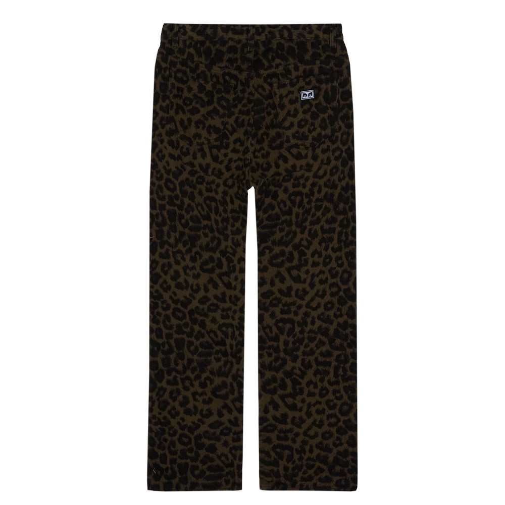 Back flat lay view of the Obey Studded Boxcar Straight Leg Denim in Dark Leopard, displaying the straight leg cut and continuous spotted leopard pattern across the seat and legs, fitted with large back patch pockets, back yoke seam, and a small rectangular Obey Eyes logo patch stitched on the right rear pocket.