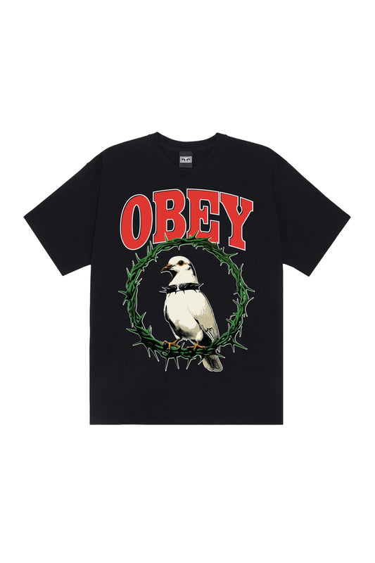 Front view of the black Obey Thorns Of Peace T-Shirt, crafted from heavy 6oz 100% cotton jersey with a loose boxy fit, featuring an arched red collegiate Obey logo with white borders above a white peace dove wearing a spiked punk collar inside a green crown of thorns wreath.