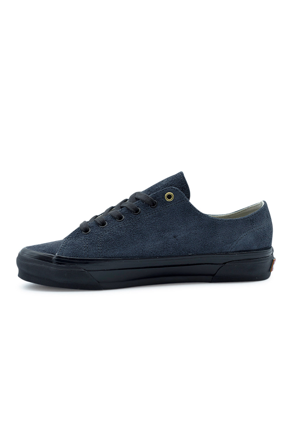 Lateral profile of OTW by Vans x Julian Klincewicz Style 31 sneaker with dark navy shag suede, vulcanized rubber sole and elevated archive footwear styling