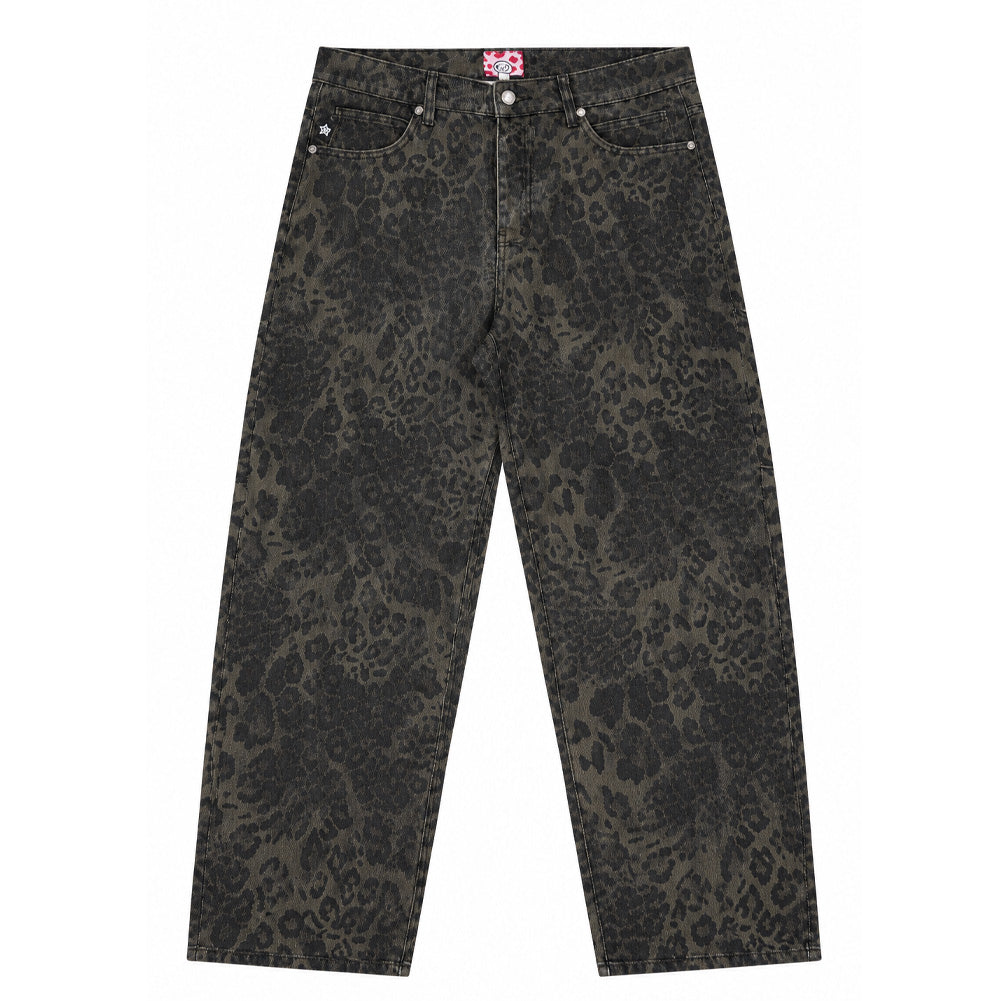 Front flat lay studio view of the olive-and-black Starteam East Village Leopard Star Jeans, highlighting the wide straight-leg skate pants silhouette, classic five-pocket configuration with engraved metal rivets, zip fly closure with custom star-embossed tack button, and an allover washed olive-drab leopard camouflage pattern.