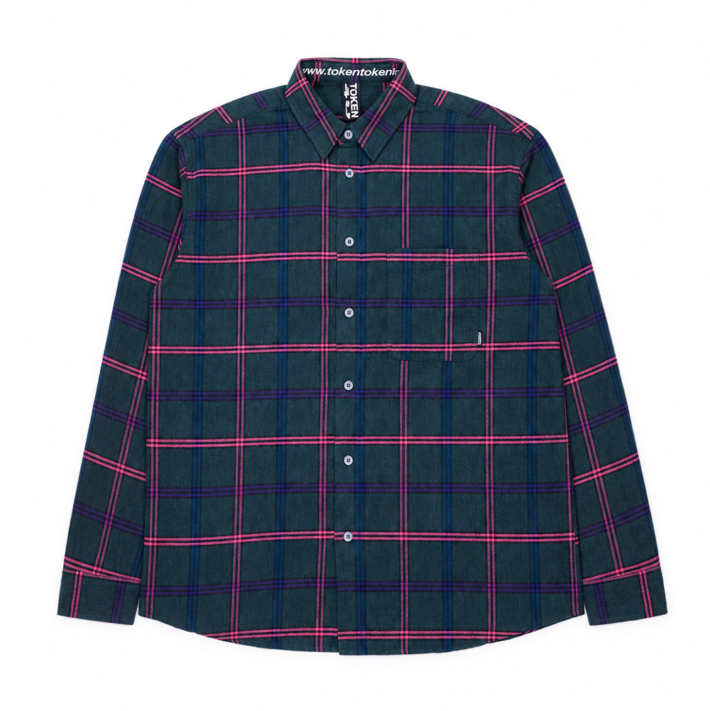 Front flat lay studio view of the Token Hardware Long Sleeve Shirt in Midnight Green Plaid, showcasing a relaxed skateboarder fit tailored in heavy flannel twill, buttoned front placket with grey pearlized buttons, point collar with branded inner tape, single open patch pocket on the left chest with a woven black logo flag tag, and an all-over grid check combining dark forest green, bright pink lines, and deep purple accent stripes.