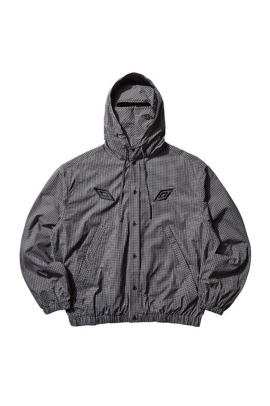 Front view of the Umbro Gingham Masked Shirt Coffee Brown / White, showcasing the button-up closure, embroidered Umbro double diamond logo and relaxed oversized fit for contemporary urban layering.