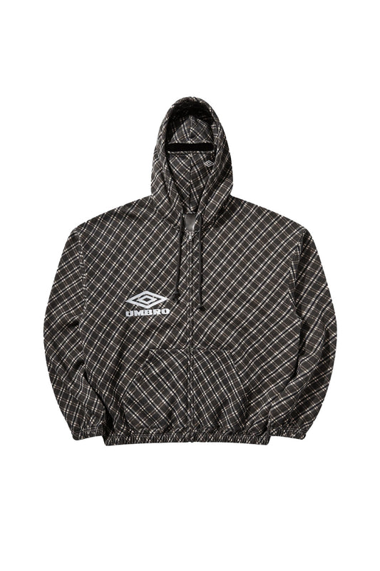Front flat lay view of the Umbro Plaid Masked Hoodie in brown, featuring a diagonal tartan check pattern in brown, beige, and black tones, a full metal front zip, split kangaroo pouch pocket, elasticated hem and cuffs, white embroidered Umbro diamond logo on the right chest, and a hood equipped with an integrated matching plaid balaclava face mask with a bound horizontal eye slit