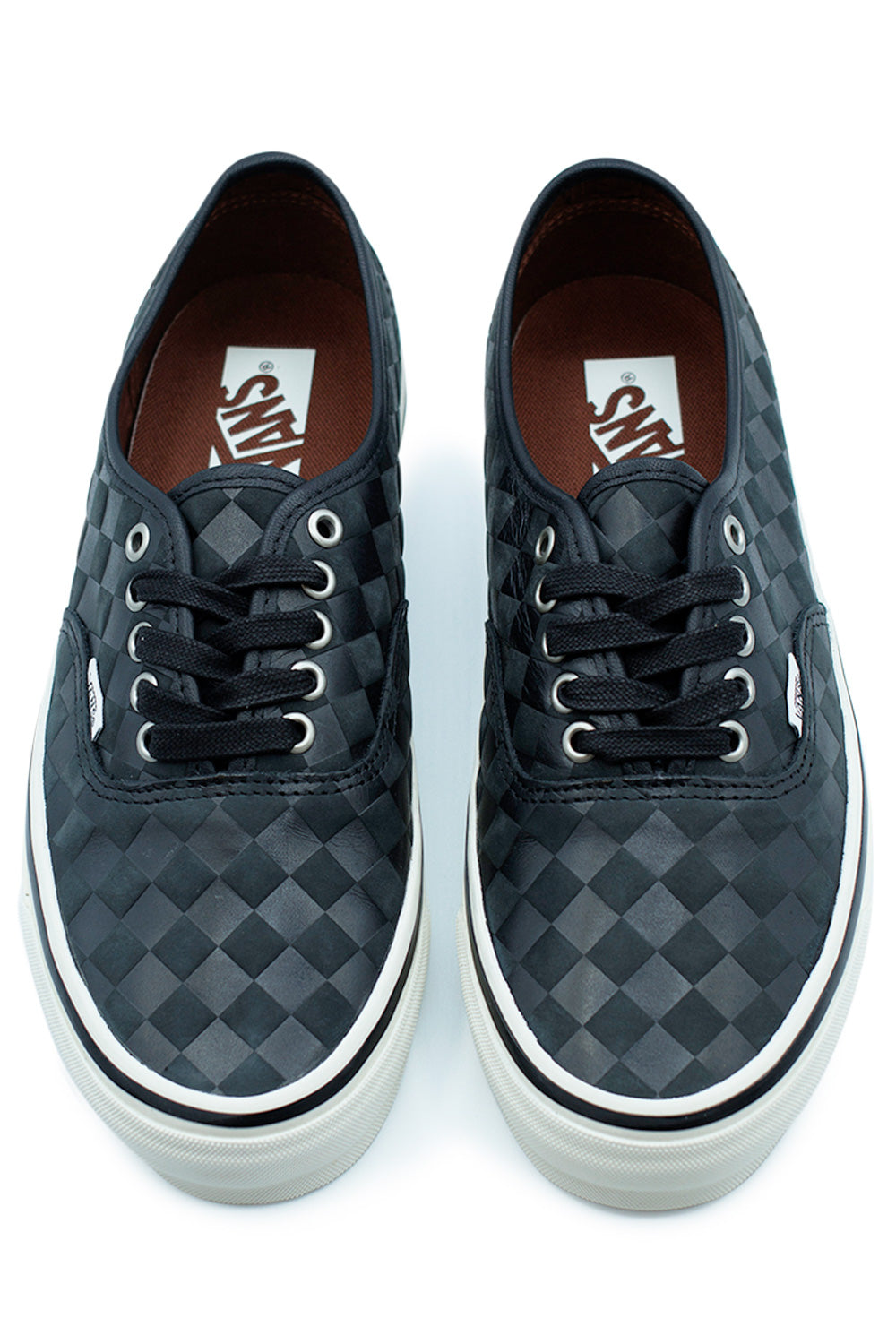 Top view of Vans LX Authentic 44 Diamond Check Blackout sneaker showing textured black leather checkerboard pattern, metal eyelets and classic Vans Authentic skate shoe construction
