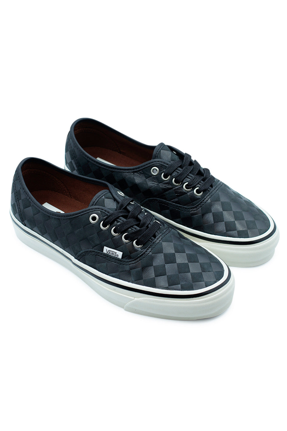 Vans LX Authentic 44 Diamond Check Blackout skate shoes angled pair view highlighting embossed diamond checker texture, low-top silhouette and heritage Vans skateboarding design