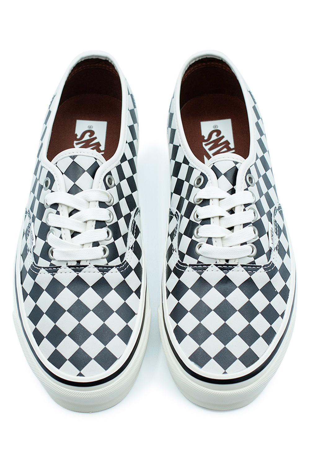 Top view of Vans LX Authentic 44 Diamond Check Black White sneaker showing black and white embossed checkerboard leather upper, white laces and heritage Vans skate shoe construction