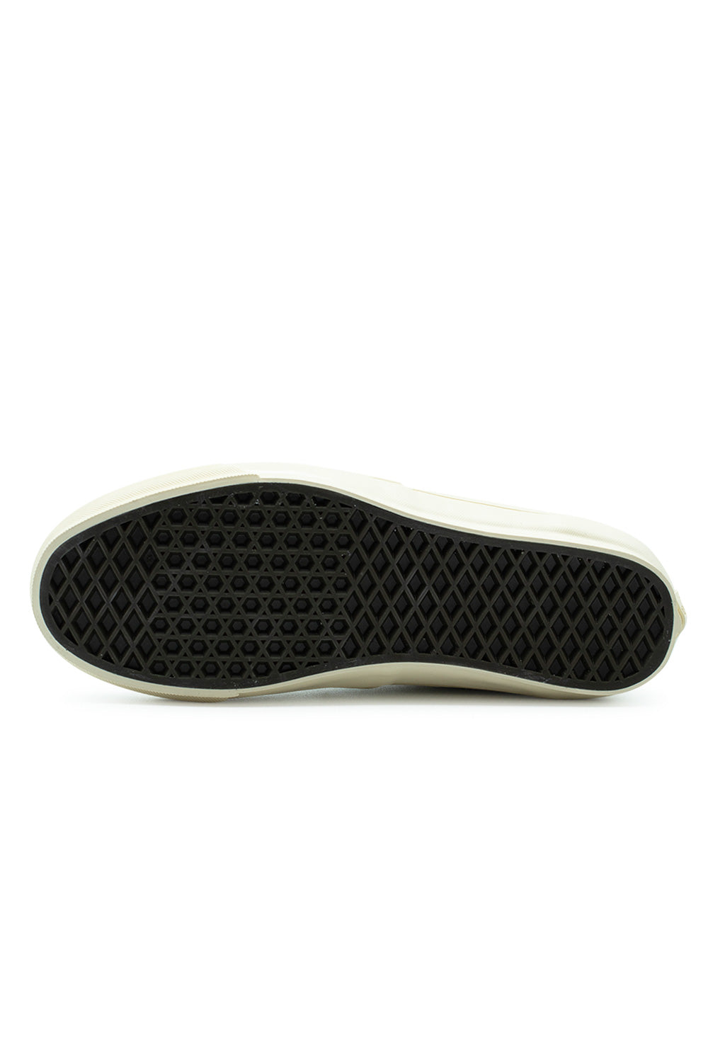 Full bottom view of the dark brown vulcanized rubber waffle tread outsole on the Vans LX Authentic Ease Hairy Suede Sand sneaker, engineered for classic skateboard traction and boardfeel.