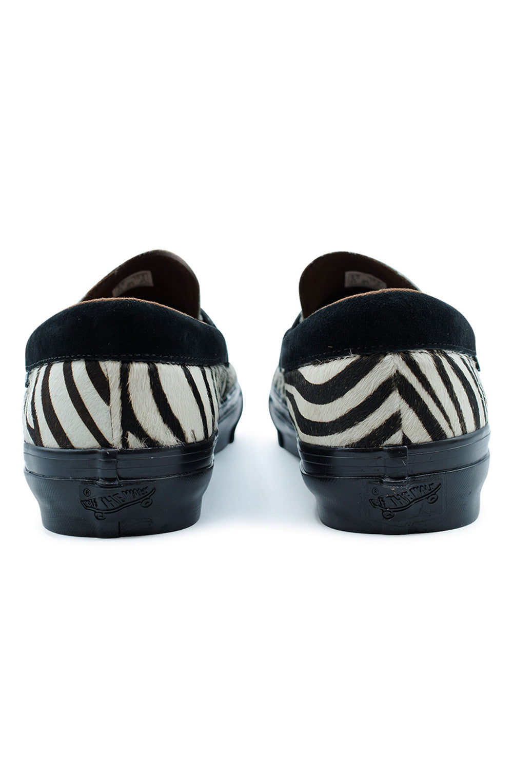 rear view Vans LX Loafer 53 pony hair zebra highlighting padded collar, glossy sidewall and durable vulcanized outsole for everyday comfort and long-lasting wear