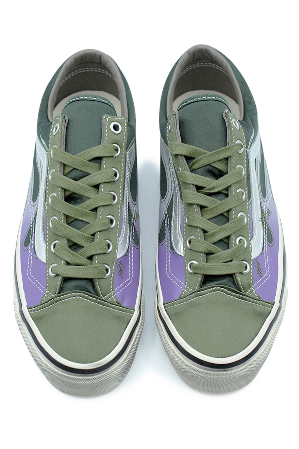 overhead view of Vans Old Skool 36 LX Green Balsam showcasing clean lace setup, soft inner lining and bold contrast between muted green canvas and purple flame inserts