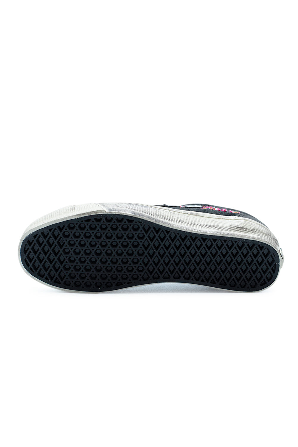 Bottom view of the classic black rubber waffle tread outsole on the Vans LX Old Skool 36 Souvenir Faded Black sneaker, built for direct skateboard grip and boardfeel.