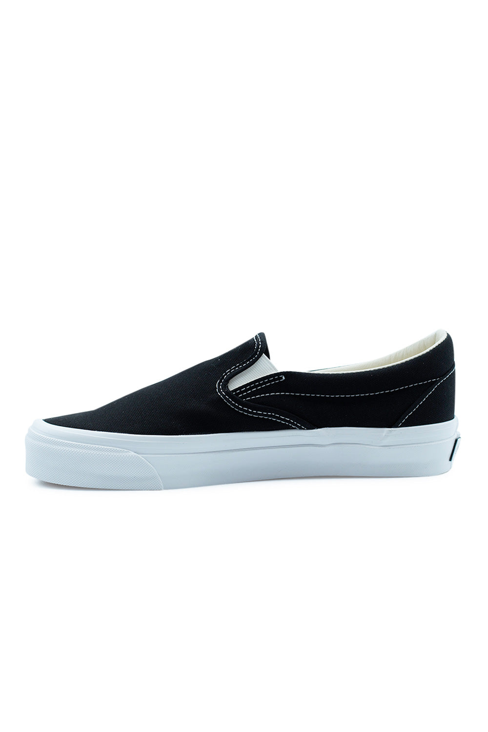 Vans LX Slip-On Reissue 98 Black White classic skateboarding slip-on sneaker with breathable canvas upper, heritage Vans shape and flexible vulcanized rubber construction