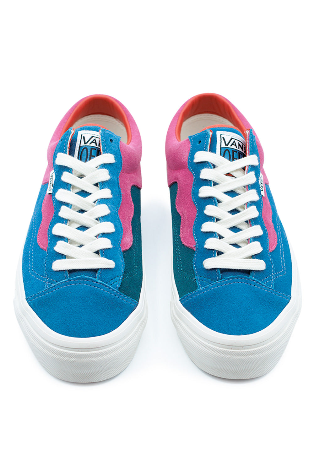 Top view of Vans OTW x Parra Old Skool 36 sneakers with blue, pink and green suede panels, white laces, custom Vans Parra tongue labels and premium skate construction