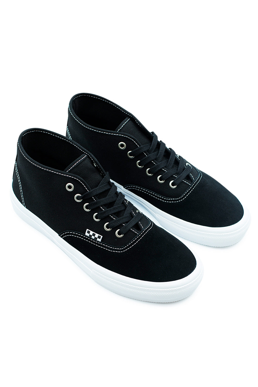 Angled pair of Vans Skate Authentic Mid Black White skate shoes highlighting suede toe panels, canvas sidewalls, internal tongue straps, and SickStick waffle grip sole.