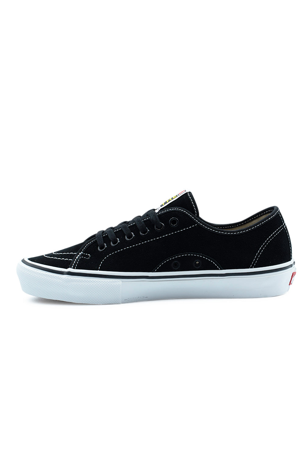 Medial side profile view of the Vans Skate AVE Classic shoe in Black / White, detailing the inner black suede panel with arched white stitching, ventilation eyelets, white vulcanized sidewall, and subtle embossed DURACAP logo on the front midsole.